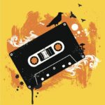 A black and white cassette tape with a bird on top of it.