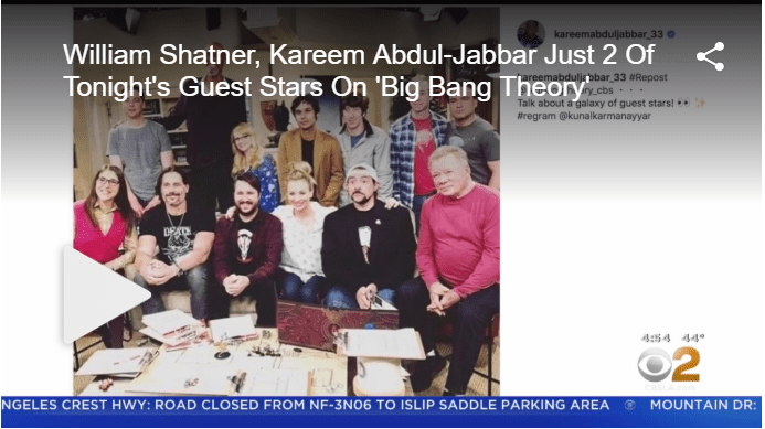 A group of people sitting in front of each other.