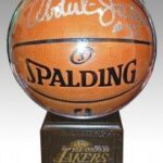 A basketball with the lakers ' signatures on it.