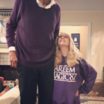 A man and woman standing next to each other.